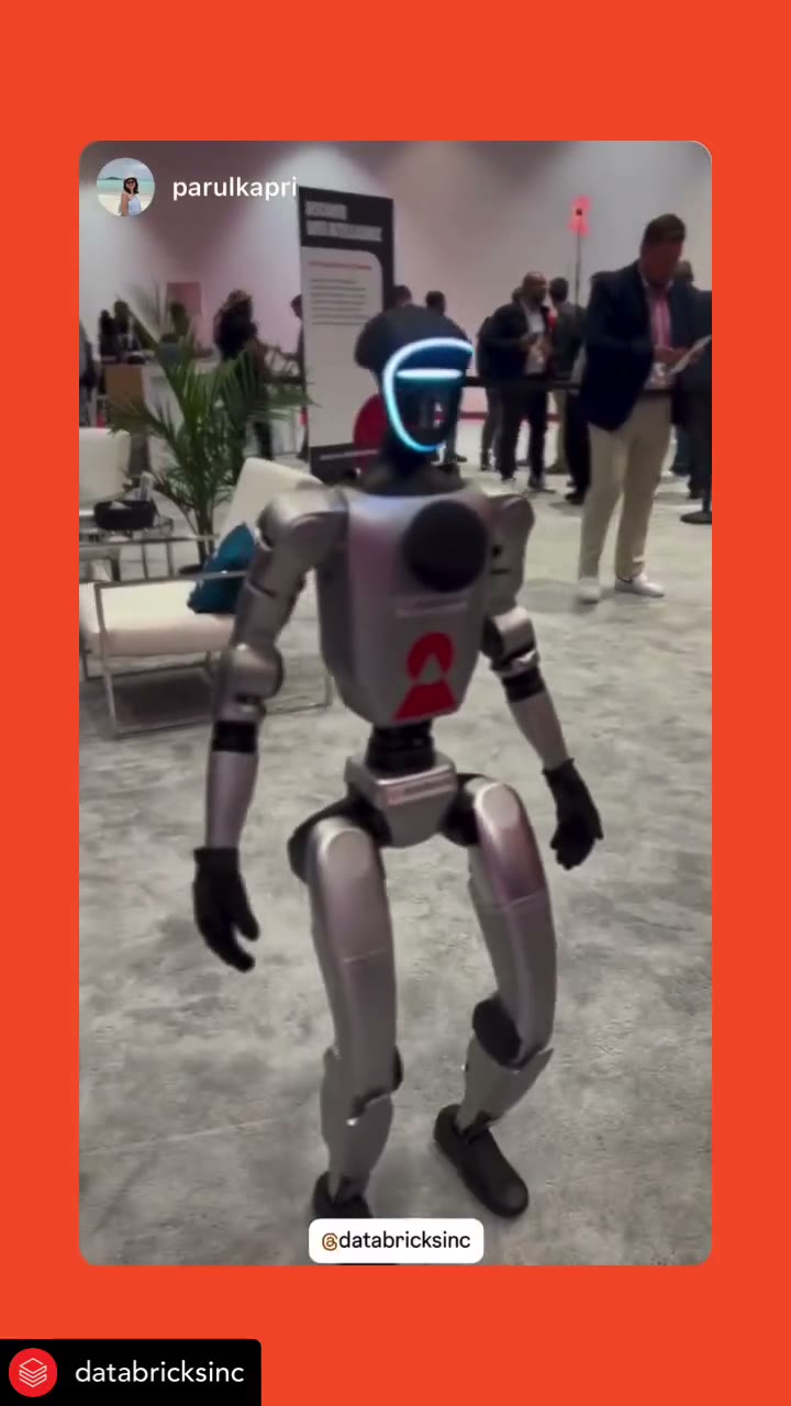Humanoid Henry robot greeting attendees on the Databricks event floor