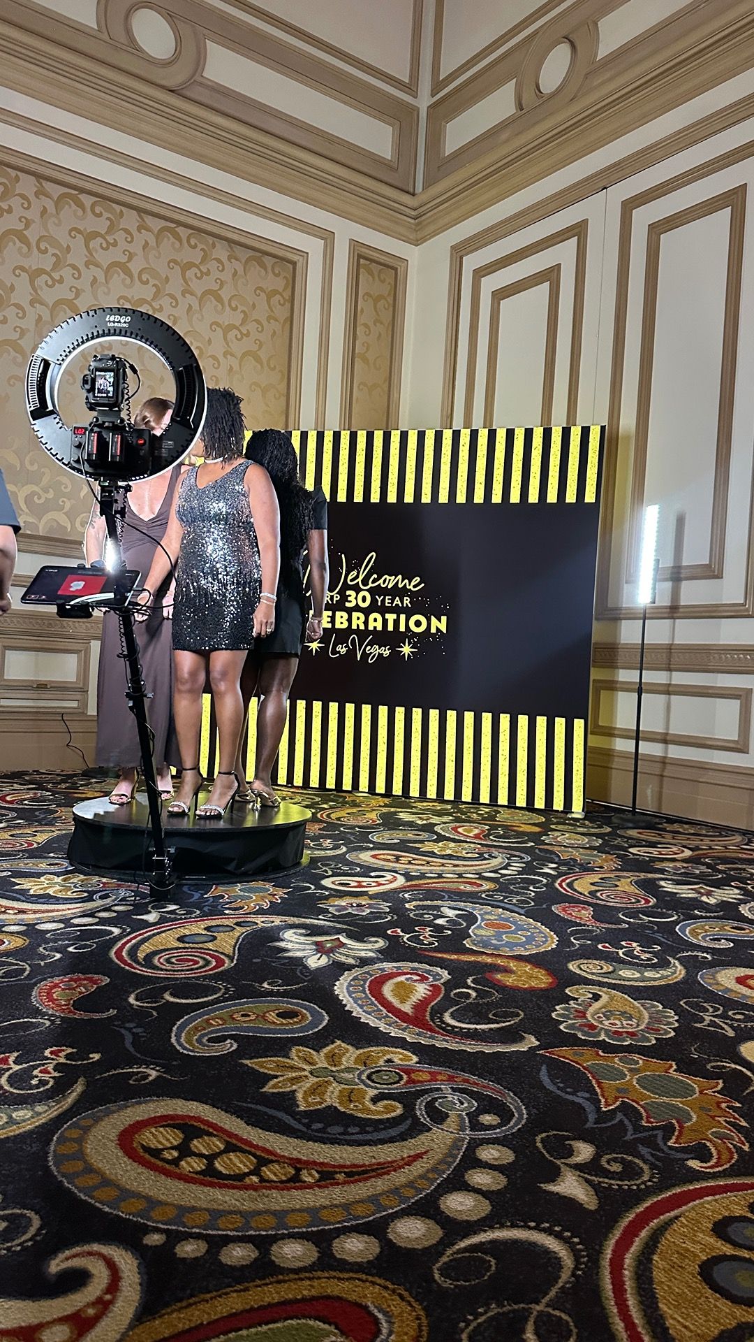 Guests creating slow-motion content on a 360 video booth platform