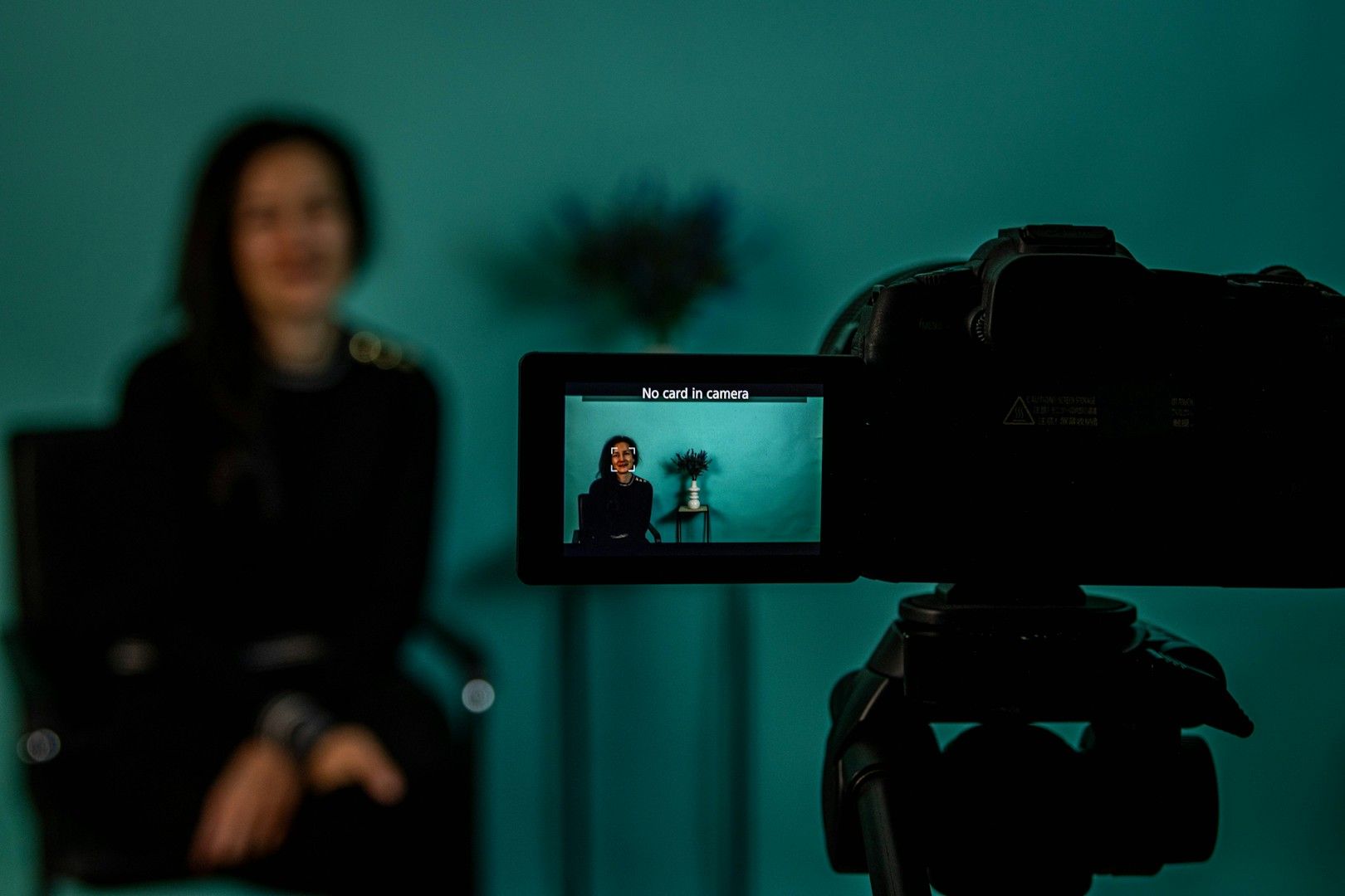 Guest recording a professionally lit video testimonial at an event