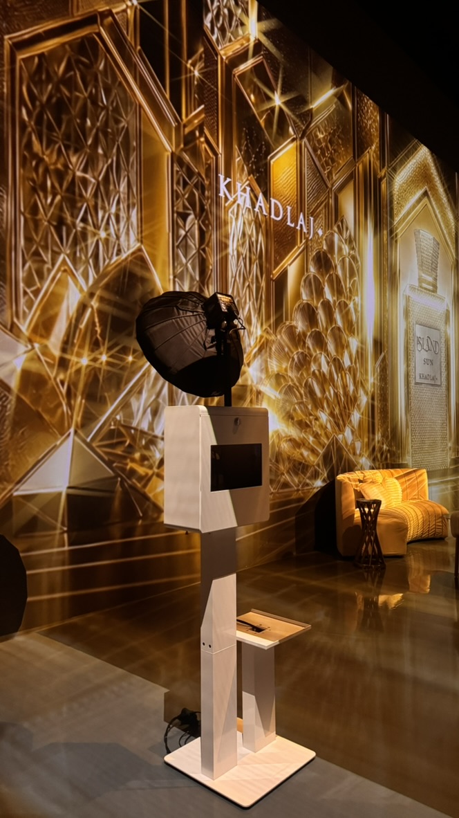 Portrait booth and lighting integrated into the Khadlaj fragrance event environment