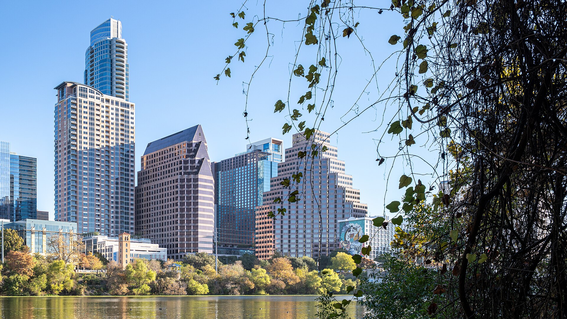 Downtown Austin skyline reflected across Lady Bird Lake