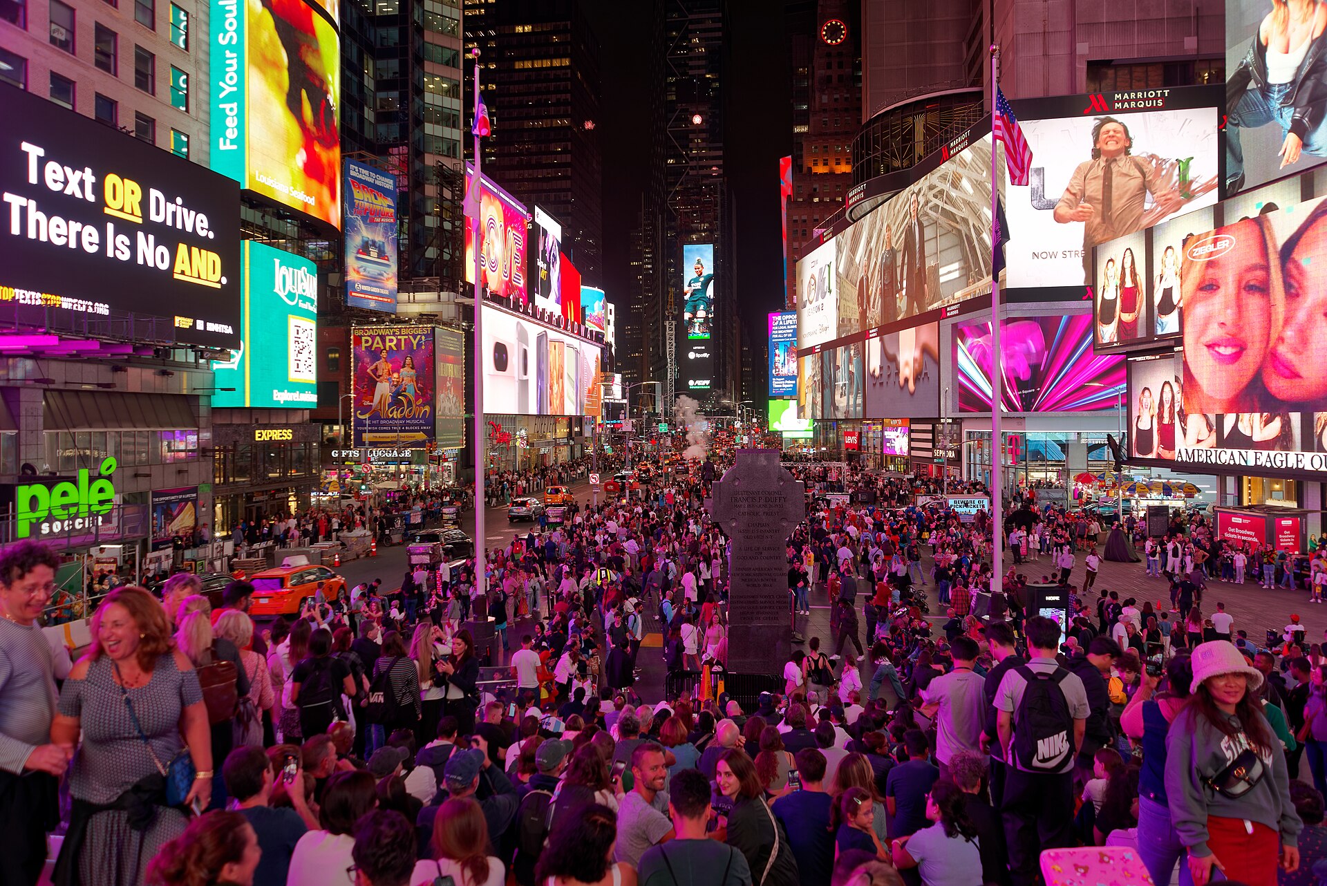 Times Square illuminated at night in New York City
