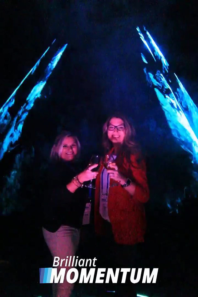 Guests framed by the programmed overhead laser light treatment